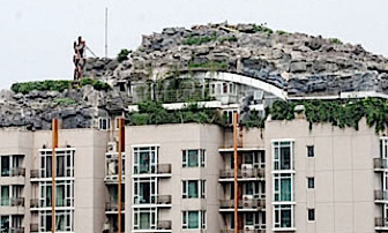 Chinees moet illegaal rotspaleis op flat afbreken