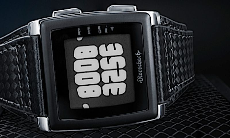 Dit horloge met eInk-scherm toont tijd in inktvlekken