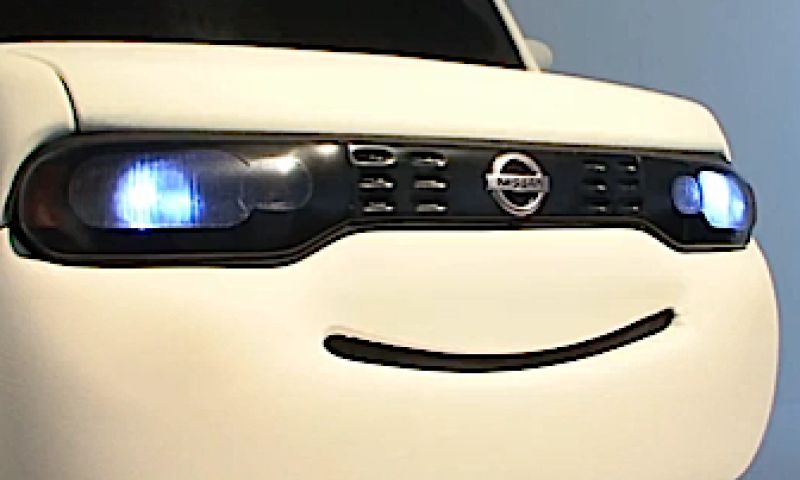 Een smiley op je motorkap