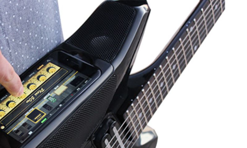 Overal draadloos rocken: gitaar met speakers en iPhone-dock